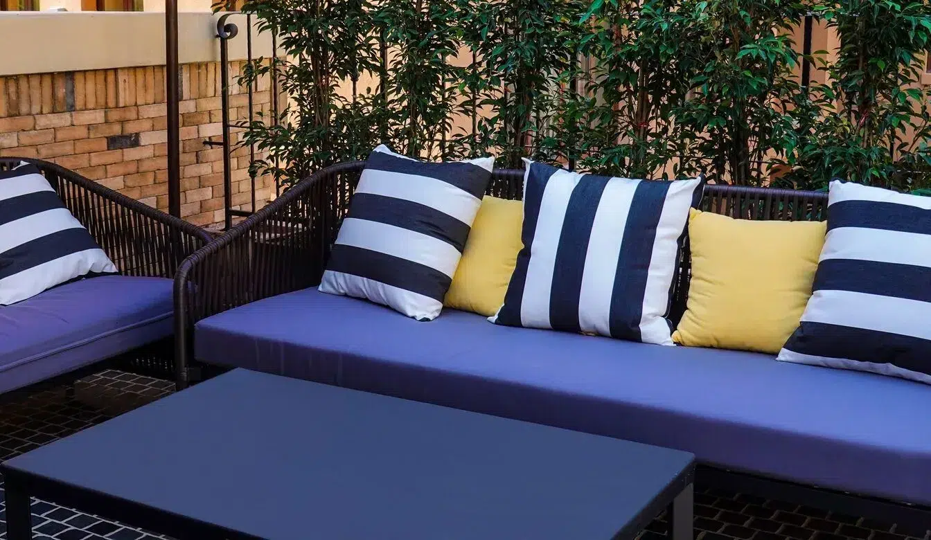 Fresh outdoor patio seating with clean cushions